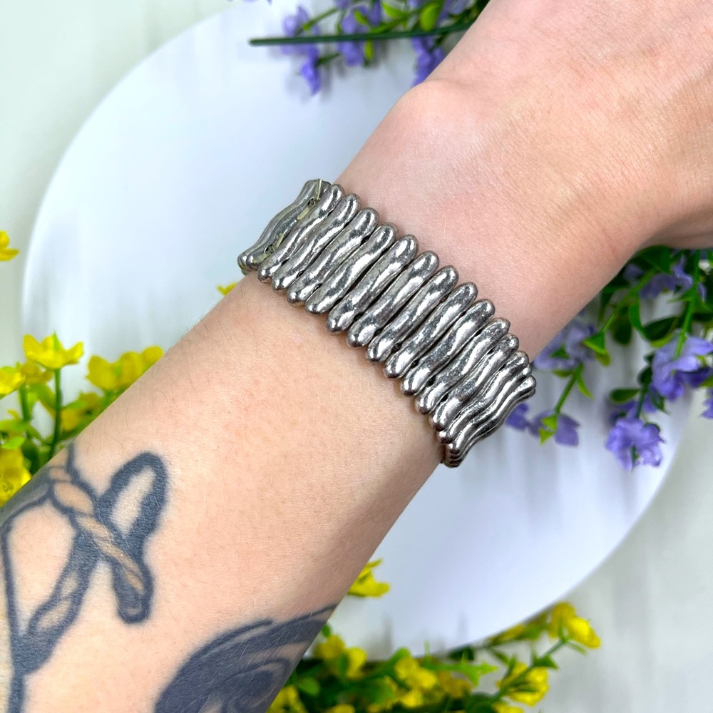 Avant Garde Signed Vintage Stretch Silver Plated Brass Bracelet
